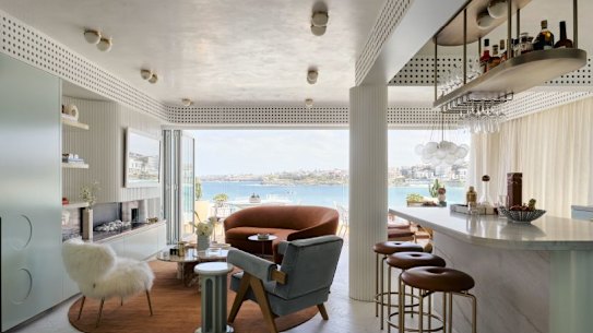 Mid century meets 21st century design in this kitchen with integrated bar by Greg Natale.