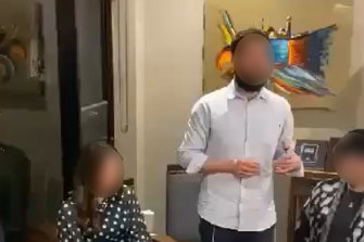 Screenshots of the man giving the speech at the gathering.