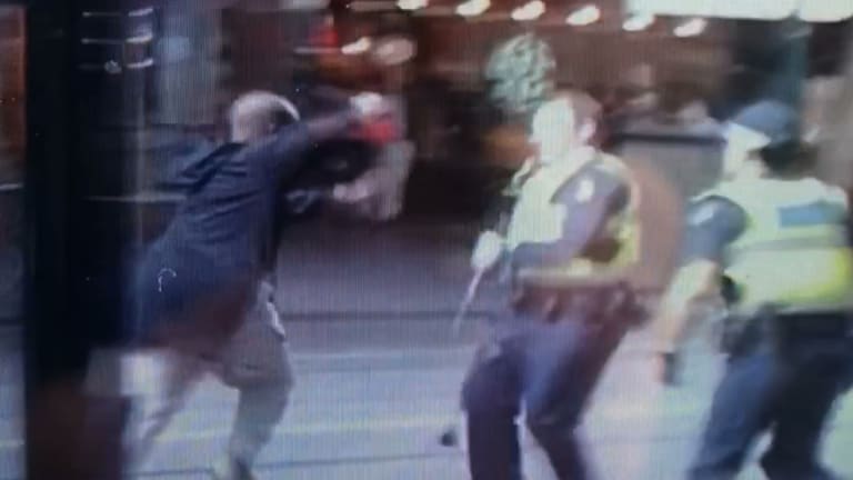 Hassan Khalif Shire Ali lunge at police with a knife before he was shot in the chest.