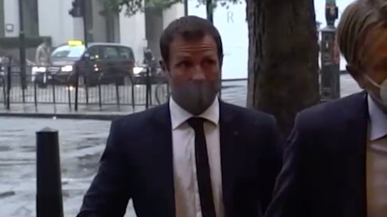 Lucas Neill (left), trailing new Matildas coach Tony Gustavsson and Australia's High Commissioner to the UK, George Brandis.