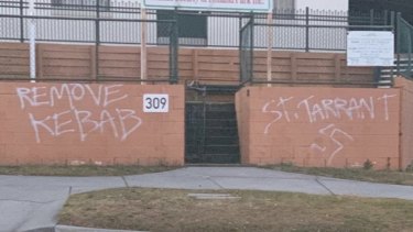 The graffiti sprayed on the outer wall at the Holland Park mosque in Brisbane's south.