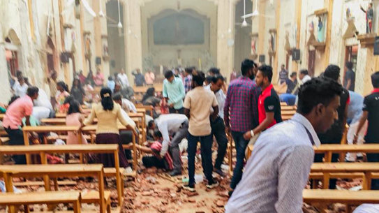 Chaos inside St Sebastian's Church in Katuwapitiya, Negombo.