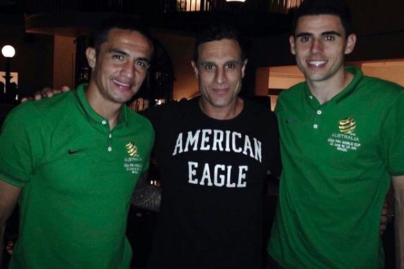 Bernal more recently, flanked by Socceroos and former clients Tim Cahill (left) and Tom Rogic (right). 