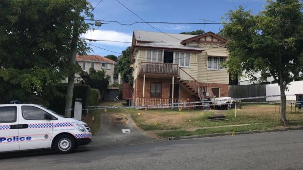 Homicide detectives at the Hunter Street home in Kelvin Grove where Mr Frescon died.