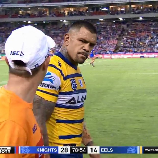 If looks could kill: Manu Ma'u has a 'discussion' with an Eels trainer over a head injury assessment.