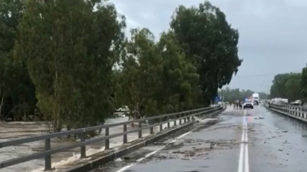 Raging floodwaters in the Townsville suburb of Bluewater.