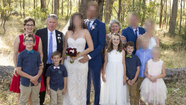 Peter Miles (second from left), his wife, Cynda (back right), their daughter Katrina (left), and her four children, Taye, Rylan, Ayre, and Kadyn.