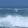 On-duty lifeguard wins Hawaiian event in 50-foot surf as wave sweeps baby under beach house