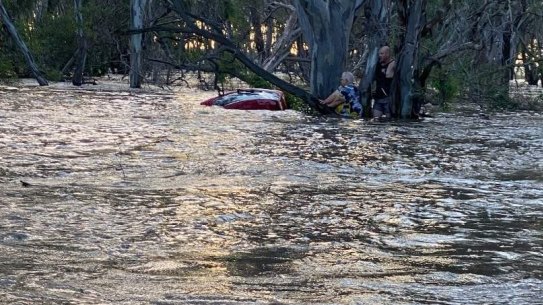 A woman aged in her 70s is lucky to be alive after she was swept away in flood waters in Elmore.