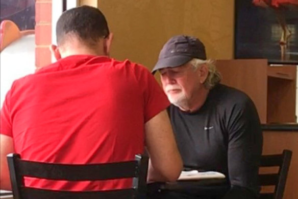 Casey councillor Sam Aziz and developer John Woodman meeting at a Subway restaurant in April 2018.