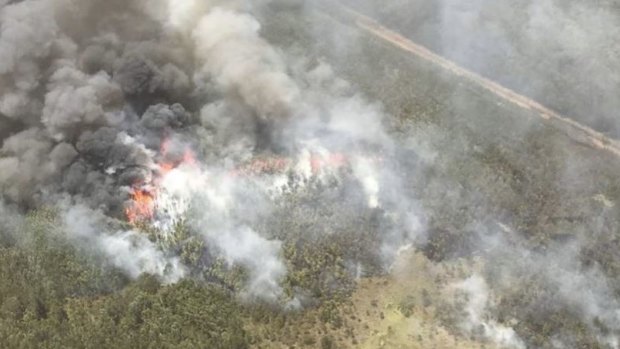 More than 50 fires continue to burn across Queensland. 