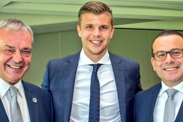 Mario Biasin (left) and Victory chairman Anthony Di Pietro (right) in 2015 with the club’s former goalkeeper Mitch Langerak.