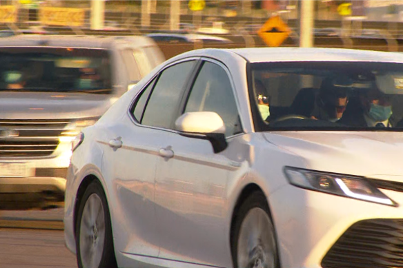 Novak Djokovic arrives at Melbourne Airport on Sunday night.