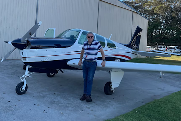 Pilot David Stephens with his 1966 Beechcraft Debonair aircraft.