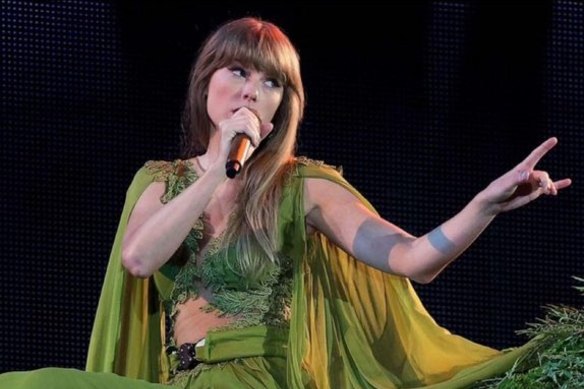 Taylor Swift dons her green dress for the Folklore era.