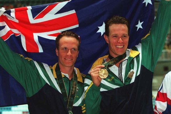 Silver medallist Daniel Kowalski and Olympic champion Kieren Perkins after the 1500m in Atlanta.