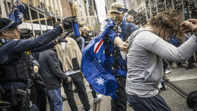 Neo-Nazis lead violent anti-immigration march as clashes break out in CBD