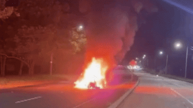 BMW crash in western Sydney splits car, downs powerlines and ignites fire