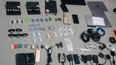 Items confiscated from the Ecuadorian residence of Swedish programmer Ola Bini. 