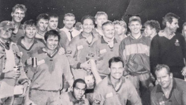 Justin Harrison (second from left, back row) and Darren Coleman (fourth from left, back row) celebrating a 1993 premiership for Southern Cross University. 