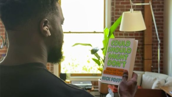A video buried in an Apple software update shows how a yet-to-be-announced AirPods model can save things you see, like the title of a book, for later.