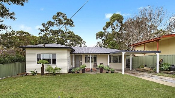 The weatherboard home before an extensive renovation.