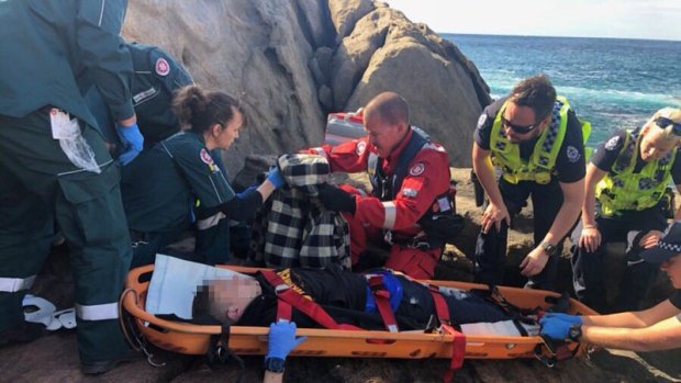 The teenager was assisted by rescue workers.