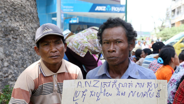 Cambodian villagers protesting in 2014 after they were forcibly evicted from land to make way for a sugar plant financed by the ANZ bank.