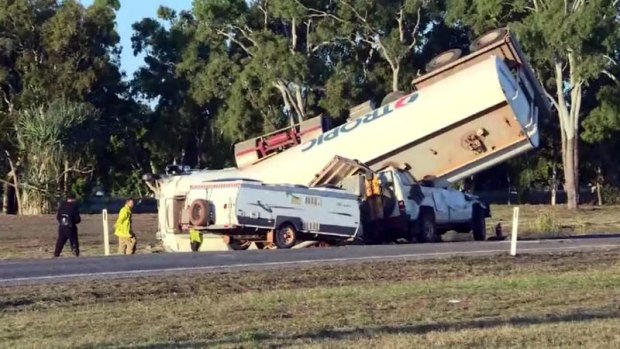 Three people have died after a tanker collided with two cars in Queensland's north.
