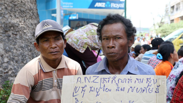 Cambodian villagers protesting in 2014 after they were forcibly evicted from land to make way for a sugar plant financed by the ANZ bank.