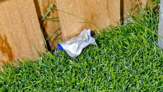 The woman staged a fake crime scene that included a condom wrapper. 