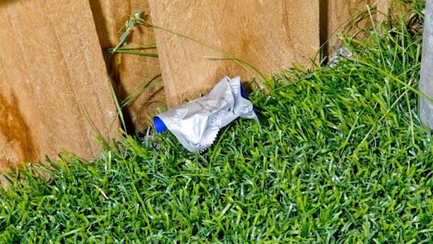 The woman staged a fake crime scene that included a condom wrapper. 