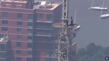 A daredevil couple climbed the Empire State Building in New York to stage their engagement.