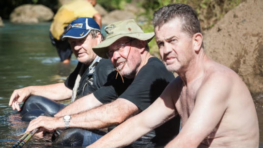 Tommy Raudonikis with Roy Masters and Phil Sigsworth during their adventures on the Kokoda Track in 2012.