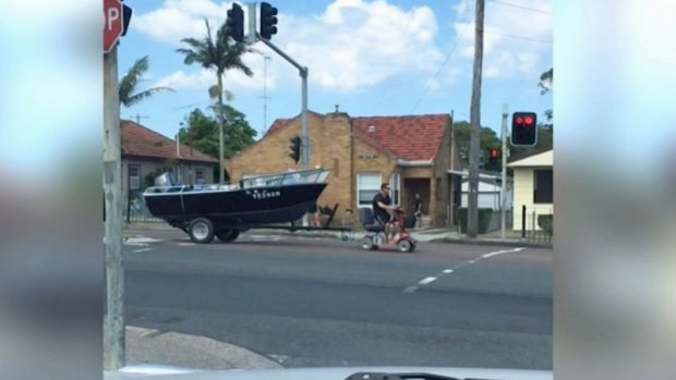 A video of Mr Swancott towing his 17 foot boat on a mobility scooter went viral online. 