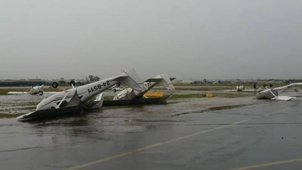 Planes flipped over at Archerfield Airport by a 140km/h wind gust during Brisbane's severe storms in 2014.