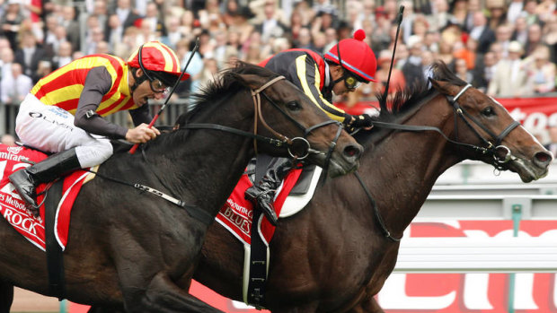 Japanese quinella: Yasunari Iwata on Delta Blues holds off Damien Oliver on Pop Rock to win the 2006 Melbourne Cup.