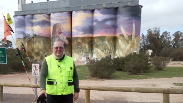 Canberra man Shane Stroud at Kimba in South Australian, known as the half-way point across Australia and now home also to this beautiful mural on grain silos by Melbourne artist Cam Scale.
