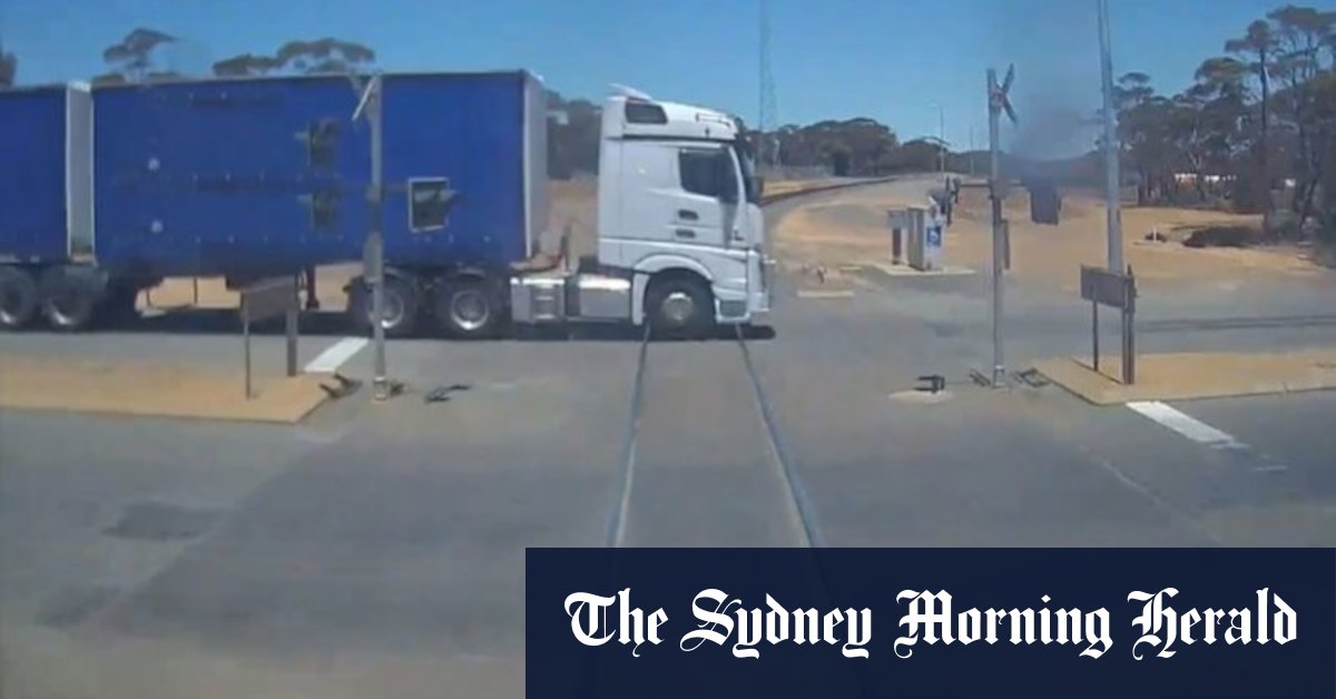 Watch the heart-stopping moment a freight train barely misses truck - Vimarsana News