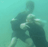 Molly Picklum wrestling underwater.