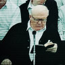 Bruce Hales (front left), the global leader or the Plymouth Brethren Christian Church, preaching in the US.
