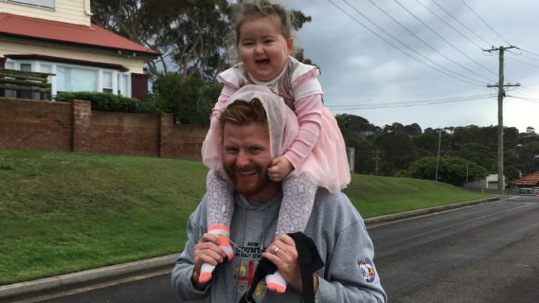 Josephine Dun, 3, shares a moment with her dad, Dr Matt Dun, during her treatment.  