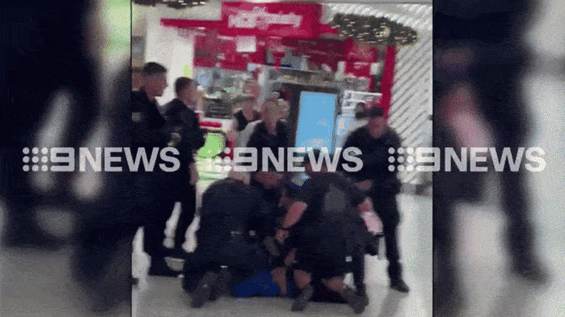 Dramatic arrest in Sydney Westfield after allegedly armed man flees police pursuit