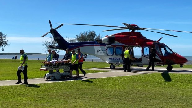 The shark attack victim was flown to Cairns Hospital by a QGAir helicopter.