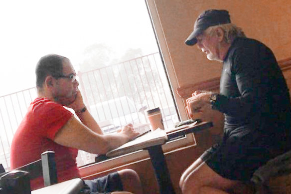 Casey councillor Sam Aziz (L) and developer John Woodman (R) meet at a Subway restaurant in April 2018. 