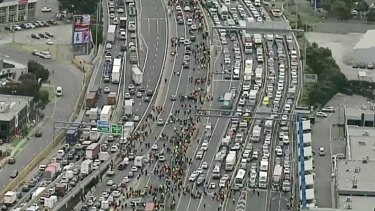 Aerial footage of the protesters approaching the West Gate Bridge on Monday.