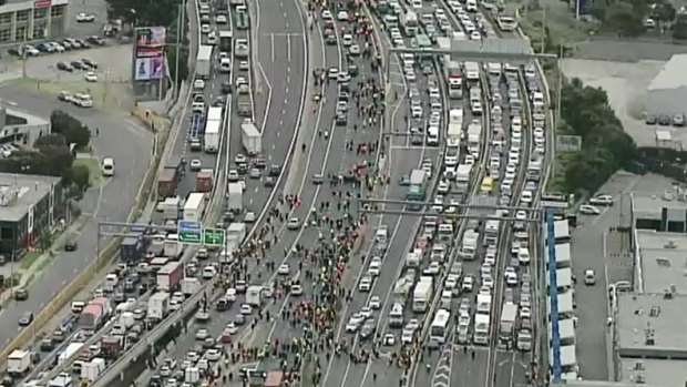 Aerial footage of the protesters approaching the West Gate Bridge on Monday.
