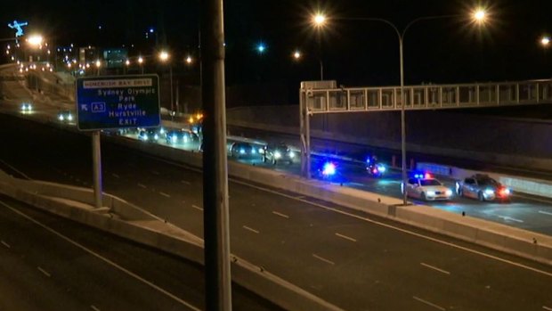 A convoy passes through at the opening to traffic of the M4 East tunnels at 2am on Saturday.