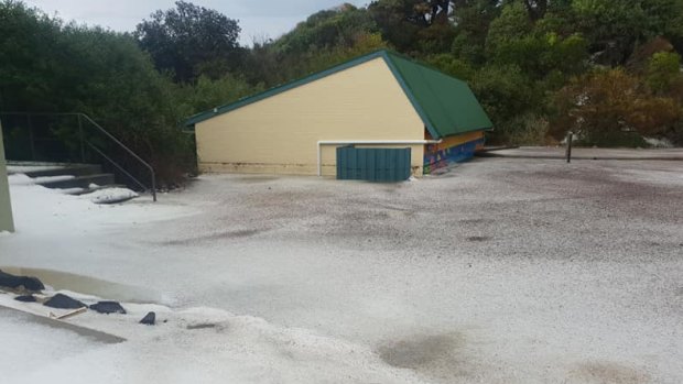 Facilities half submerged in slush and hail