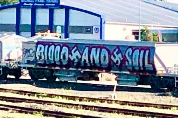 The original pro-Nazi graffiti on the carriage.
